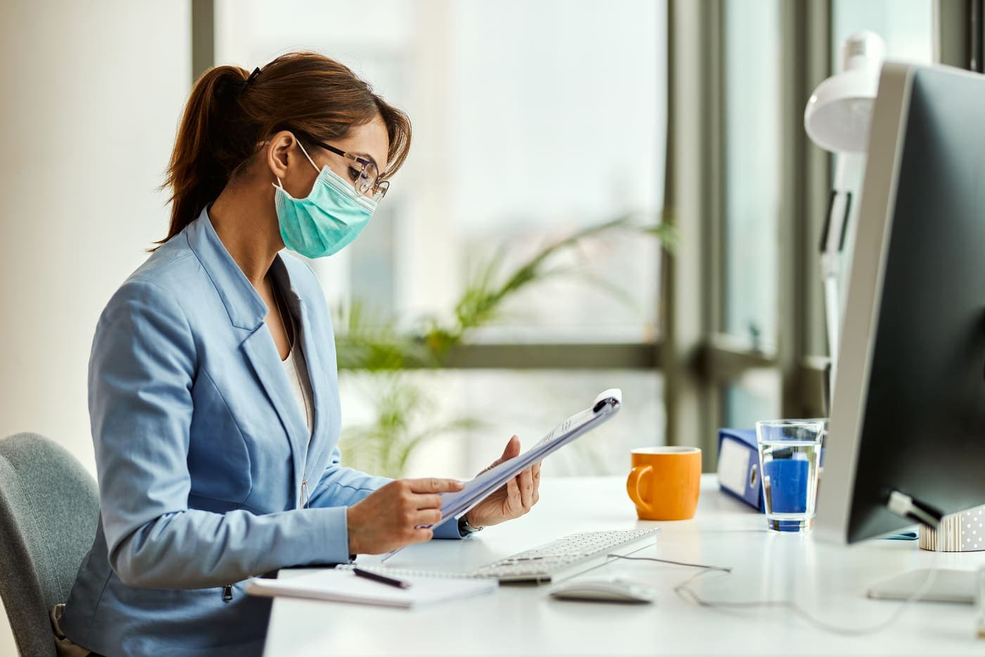 Revenue cycle analyst reviewing billing performance reports for a healthcare practice